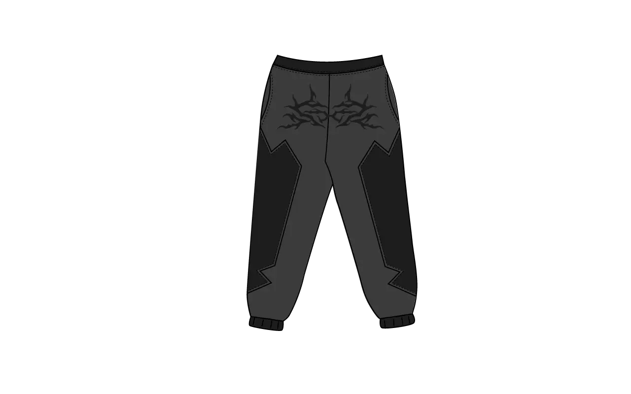 Black and gray Dystrophic joggers with graphic design and tapered cuffs, front view.
